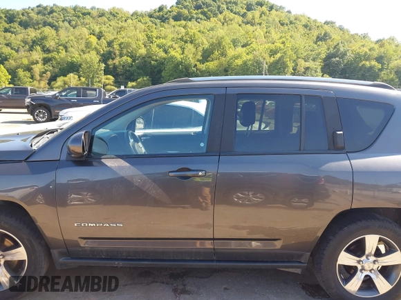2016 Jeep Compass Latitude with VIN 1C4NJDEB4GD709019, listed as a IAAI auction lot 40250883 with 108,178 mi miles and . Bid and sale history available at DreamBid. Image 14.