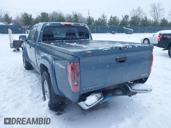 2006 GMC Canyon SLE Z71 z VIN 1GTDS196568168235, wystawiony jako IAAI lot #41399545 z przebiegiem 119 533 mil mil oraz . Historia ofert i sprzedaży dostępna na DreamBid. Obrazek 3.
