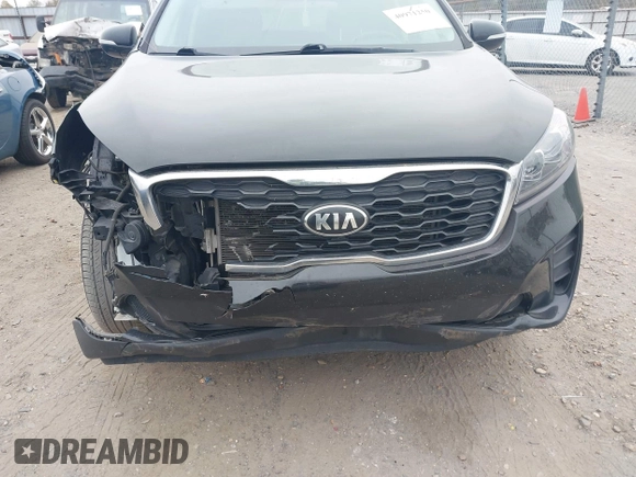 2019 Kia Sorento LX with VIN 5XYPG4A34KG579484, listed as a IAAI auction lot 40971250 with 142,327 mi miles. Bid and sale history available at carsss.com. Image 17.