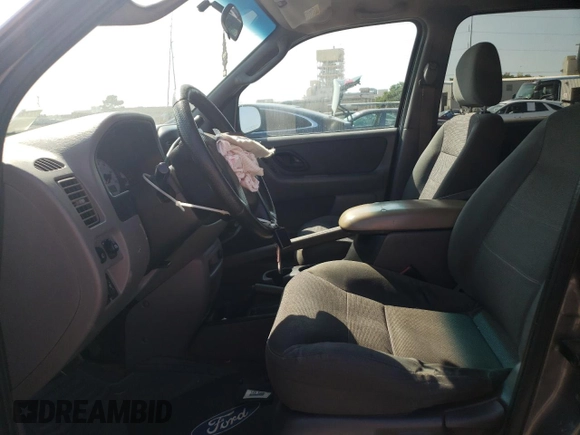 2002 Ford Escape XLT Choice с VIN 1FMYU04132KD68301, выставлен на аукционе Copart как лот 59854935 с пробегом Не указан миль и Списание • Salvage title. История ставок и продаж доступна на DreamBid. Изображение 7.