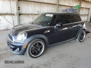 2013 MINI Hardtop S with VIN WMWSV3C54DT393182, listed as a Copart auction lot 58229265 with 59,459 mi miles and Salvage title. Bid and sale history available at DreamBid. Image 1.