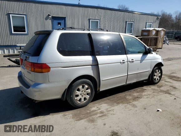 2004 Honda Odyssey EX-L with VIN 5FNRL18994B117140, listed as a Copart auction lot 49677635 with 247,237 mi miles and Salvage Title. Bid and sale history available at DreamBid. Image 3.