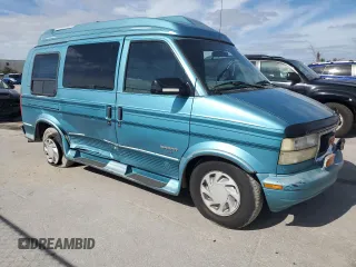 1995 GMC Safari z VIN 1GDDM19W2SB525888, wystawiony jako Copart lot #81358954 z przebiegiem 121 066 mil mil oraz Szkody całkowita. Historia ofert i sprzedaży dostępna na DreamBid. Obrazek 4.