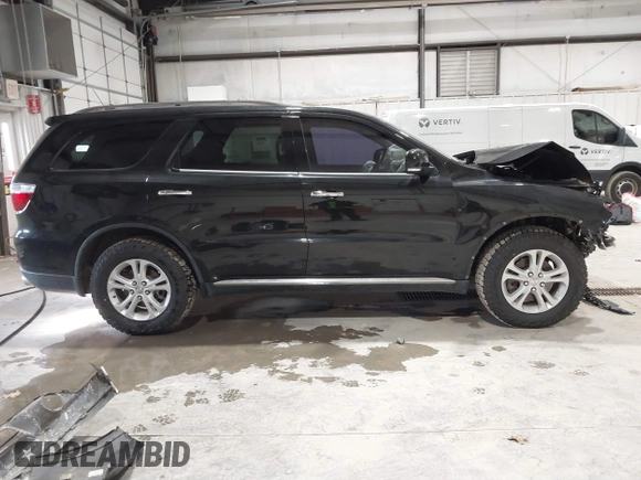 2013 Dodge Durango Crew with VIN 1C4SDJDT9DC670738, listed as a IAAI auction lot 41329419 with 149,520 mi miles and . Bid and sale history available at DreamBid. Image 14.