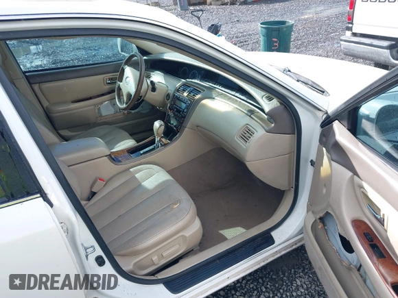 2002 Toyota Avalon XL with VIN 4T1BF28B62U242436, listed as a IAAI auction lot 41798012 with 172,708 mi miles and . Bid and sale history available at DreamBid. Image 5.