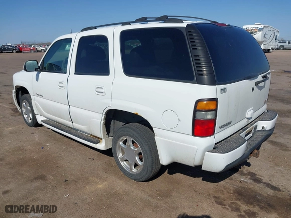 2004 GMC Yukon Denali with VIN 1GKEK63U54J251781, listed as a IAAI auction lot 42099768 with 166,543 mi miles. Bid and sale history available at carsss.com. Image 3.