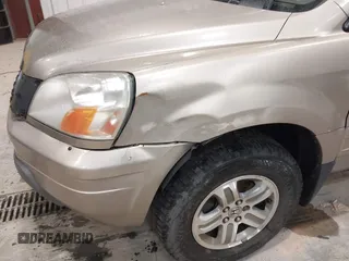 2005 Honda Pilot EX with VIN 2HKYF18475H515604, listed as a IAAI auction lot 42040563 with 320,399 mi miles and . Bid and sale history available at carsss.com. Image 6.