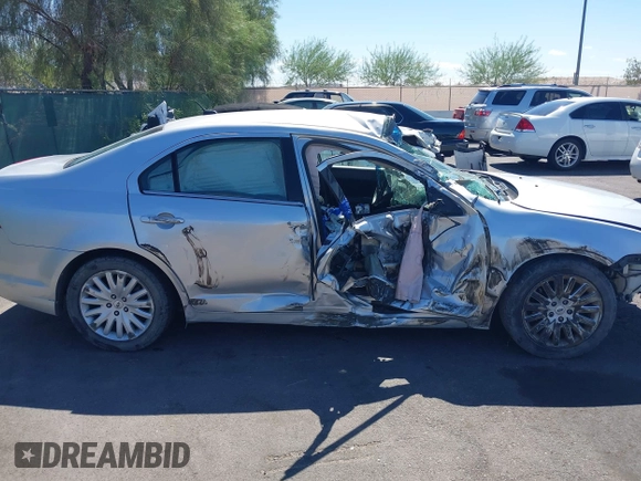 2011 Ford Fusion Hybrid with VIN 3FADP0L31BR190659, listed as a IAAI auction lot 42616065 with 122,095 mi miles and . Bid and sale history available at DreamBid. Image 13.
