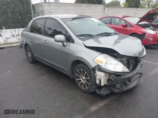 2010 Nissan Versa 1.8 S with VIN 3N1BC1AP8AL461505, listed as a IAAI auction lot 41923802 with NaN miles. Bid and sale history available at carsss.com. Image 1.