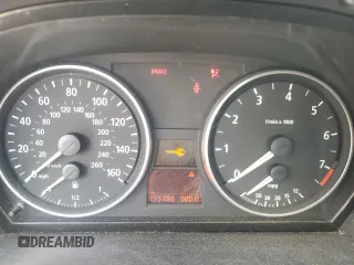 2007 BMW 3 Series 328xi with VIN WBAVC93567KX55335, listed as a Copart auction lot 60911515 with 175,798 mi miles and Salvage title. Bid and sale history available at DreamBid. Image 9.