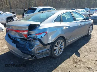 2016 Hyundai Azera Limited z VIN KMHFH4JGXGA568911, wystawiony jako IAAI lot #41428434 z przebiegiem 158 202 mil mil oraz . Historia ofert i sprzedaży dostępna na DreamBid. Obrazek 4.