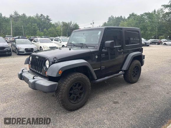 2007 Jeep Wrangler Rubicon with VIN 1J4GA64127L170574, listed as a IAAI auction lot 42474509 with 142,976 mi miles and . Bid and sale history available at DreamBid. Image 2.