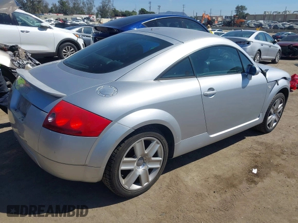 2001 Audi TT z VIN TRUSX28N211034913, wystawiony jako IAAI lot #41855142 z przebiegiem 122 354 mil mil oraz . Historia ofert i sprzedaży dostępna na DreamBid. Obrazek 4.