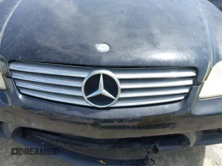2006 Mercedes-Benz CLS 500 with VIN WDDDJ75X86A067113, listed as a IAAI auction lot 42653005 with 164,574 mi miles and . Bid and sale history available at DreamBid. Image 6.