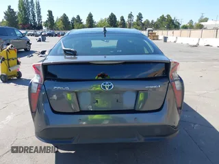 2016 Toyota Prius Four z VIN JTDKARFUXG3019426, wystawiony jako IAAI lot #42385785 z przebiegiem 94 838 mil mil oraz . Historia ofert i sprzedaży dostępna na DreamBid. Obrazek 16.