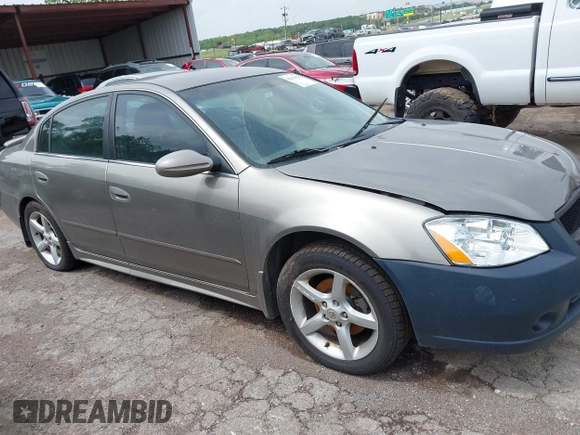 2006 Nissan Altima SE z VIN 1N4BL11D46N322200, wystawiony jako IAAI lot #42131619 z przebiegiem 248 538 mil mil oraz . Historia ofert i sprzedaży dostępna na DreamBid. Obrazek 13.