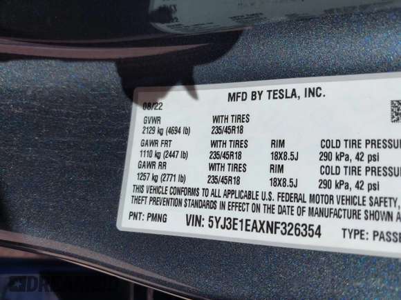 2022 Tesla Model 3 with VIN 5YJ3E1EAXNF326354, listed as a IAAI auction lot 41651872 with 27,922 mi miles and . Bid and sale history available at DreamBid. Image 9.