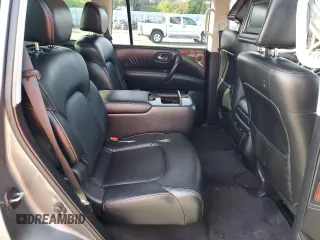 2017 Nissan Armada Platinum z VIN JN8AY2NF1H9300454, wystawiony jako Copart lot #49198605 z przebiegiem 109 546 mil mil oraz Szkoda całkowita • Salvage title. Historia ofert i sprzedaży dostępna na DreamBid. Obrazek 11.