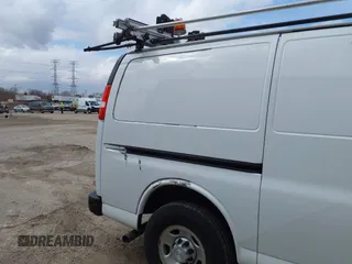 2018 Chevrolet Express Cargo Van with VIN 1GCWGAFP1J1322142, listed as a IAAI auction lot 41952498 with 155,218 mi miles. Bid and sale history available at carsss.com. Image 6.