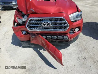 2017 Toyota Tacoma SR5 with VIN 5TFAZ5CN5HX051995, listed as a Copart auction lot 52018825 with 96,963 mi miles and Salvage Title. Bid and sale history available at DreamBid. Image 11.