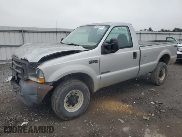 2002 Ford F-350 XL with VIN 1FTSF31F12EB21069, listed as a Copart auction lot 84287374 with 110,890 mi miles and Salvage Title. Bid and sale history available at DreamBid. Image 1.