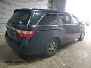 2012 Honda Odyssey EX-L with VIN 5FNRL5H6XCB100522, listed as a Copart auction lot 51431335 with 113,889 mi miles and Salvage Title. Bid and sale history available at DreamBid. Image 3.