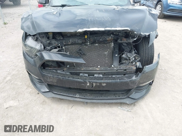 2015 Ford Mustang V6 with VIN 1FA6P8AM6F5305588, listed as a IAAI auction lot 42106438 with 100,864 mi miles and . Bid and sale history available at carsss.com. Image 6.