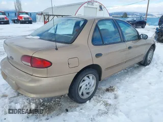 1999 Chevrolet Cavalier LS with VIN 1G1JF52T5X7239108, listed as a IAAI auction lot 41551700 with 147,139 mi miles. Bid and sale history available at carsss.com. Image 4.