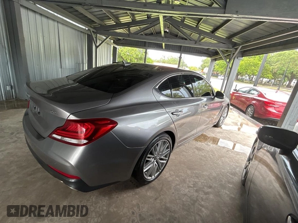 2021 Genesis G70 2.0T z VIN KMTG34LAXMU074866, wystawiony jako Copart lot #56966995 z przebiegiem 54 000 mil mil oraz Czysty tytuł • Clean title. Historia ofert i sprzedaży dostępna na DreamBid. Obrazek 4.