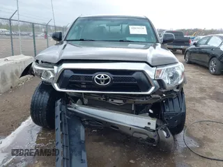 2015 Toyota Tacoma with VIN 3TMLU4EN8FM198605, listed as a IAAI auction lot 42039238 with 132,109 mi miles and . Bid and sale history available at DreamBid. Image 6.