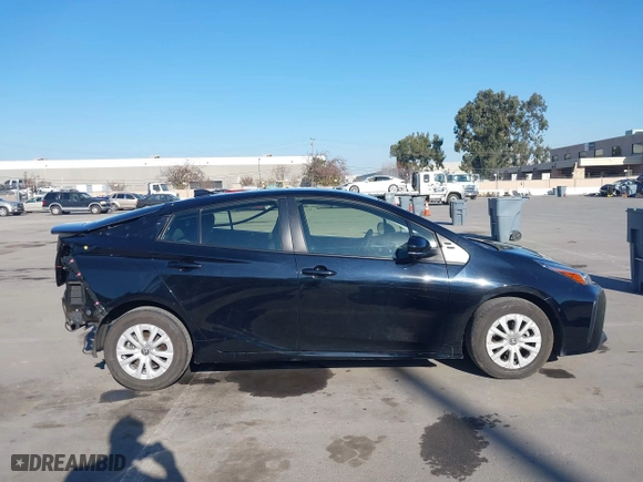 2021 Toyota Prius L Eco with VIN JTDKAMFU0M3133871, listed as a IAAI auction lot 41364847 with 66,102 mi miles. Bid and sale history available at carsss.com. Image 14.
