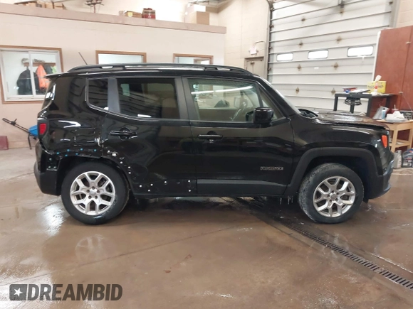 2015 Jeep Renegade Latitude with VIN ZACCJBBT0FPB52572, listed as a IAAI auction lot 41835191 with 69,030 mi miles and . Bid and sale history available at DreamBid. Image 13.