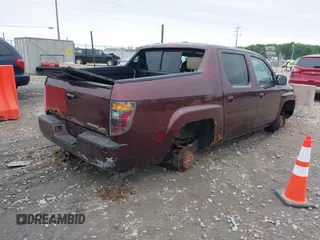 2007 Honda Ridgeline RTL z VIN 2HJYK16507H523994, wystawiony jako IAAI lot #42467682 z przebiegiem 283 292 mil mil oraz . Historia ofert i sprzedaży dostępna na DreamBid. Obrazek 4.