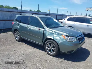 2016 Subaru Forester Touring with VIN JF2SJAVCXGH490507, listed as a IAAI auction lot 42070715 with 98,456 mi miles and . Bid and sale history available at DreamBid. Image 1.