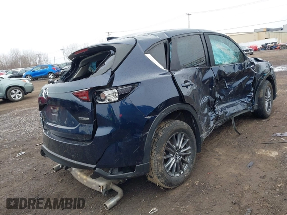 2020 Mazda CX-5 Touring with VIN JM3KFBCM9L0799502, listed as a IAAI auction lot 42007207 with 43,364 mi miles. Bid and sale history available at carsss.com. Image 4.