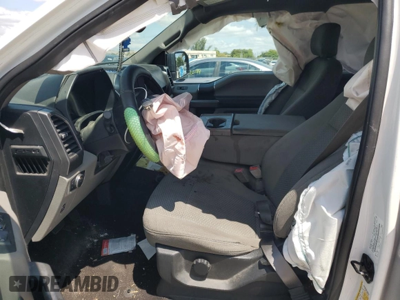 2019 Ford F-150 XL with VIN 1FTEW1C44KFA19563, listed as a Copart auction lot 52402655 with 147,071 mi miles and Non Repairable. Bid and sale history available at DreamBid. Image 7.