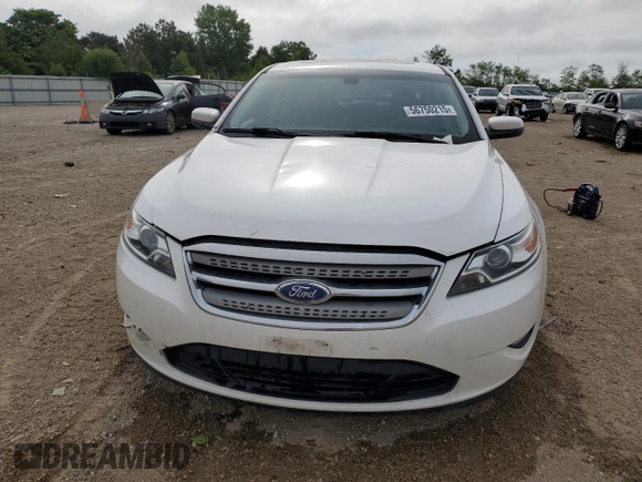 2012 Ford Taurus SEL z VIN 1FAHP2EW8CG138653, wystawiony jako Copart lot #56750215 z przebiegiem 159 631 mil mil oraz Szkoda całkowita • Salvage title. Historia ofert i sprzedaży dostępna na DreamBid. Obrazek 5.