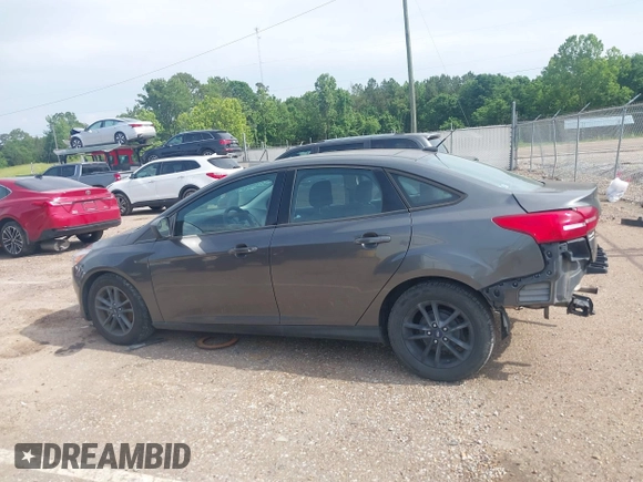 2018 Ford Focus SE with VIN 1FADP3F29JL288761, listed as a IAAI auction lot 42290510 with 93,463 mi miles and . Bid and sale history available at DreamBid. Image 15.