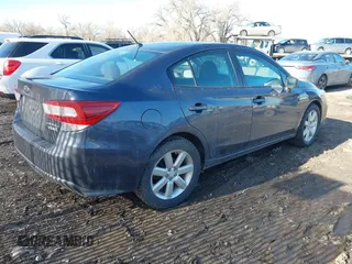 2017 Subaru Impreza with VIN 4S3GKAA62H3605343, listed as a IAAI auction lot 41703025 with 111,815 mi miles. Bid and sale history available at carsss.com. Image 4.