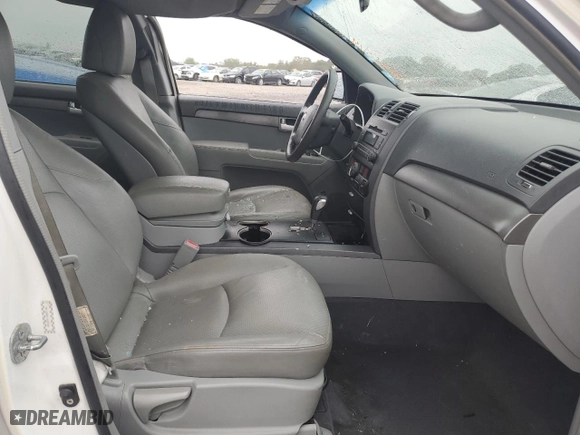 2009 Kia Borrego LX with VIN KNDJJ741795027130, listed as a Copart auction lot 72144374 with 136,979 mi miles and Salvage Title. Bid and sale history available at carsss.com. Image 7.