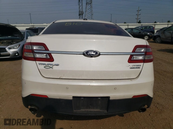 2016 Ford Taurus Limited with VIN 1FAHP2F8XGG124551, listed as a Copart auction lot 60621695 with 103,668 mi miles and Salvage title. Bid and sale history available at DreamBid. Image 6.