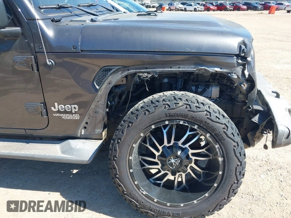 2018 Jeep Wrangler Unlimited Sport S с VIN 1C4HJXDN6JW277829, выставлен на аукционе IAAI как лот 42607187 с пробегом 107 461 миль миль и . История ставок и продаж доступна на DreamBid. Изображение 17.