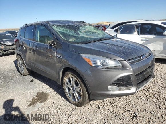 2014 Ford Escape Titanium with VIN 1FMCU9J90EUD94405, listed as a Copart auction lot 68489754 with 52,045 mi miles and Salvage Title. Bid and sale history available at DreamBid. Image 4.