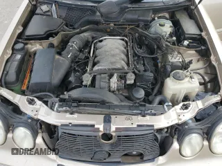 2001 Mercedes-Benz E-Class with VIN WDBJF70JX1B194075, listed as a Copart auction lot 70482944 with 218,319 mi miles and Salvage Title. Bid and sale history available at carsss.com. Image 11.