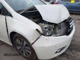 2014 Honda Odyssey Touring with VIN 5FNRL5H94EB001479, listed as a IAAI auction lot 41123678 with 147,269 mi miles and . Bid and sale history available at carsss.com. Image 17.