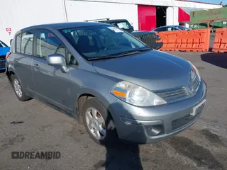 2009 Nissan Versa 1.8 S with VIN 3N1BC13E19L412248, listed as a IAAI auction lot 41669186 with 137,460 mi miles. Bid and sale history available at carsss.com. Image 1.
