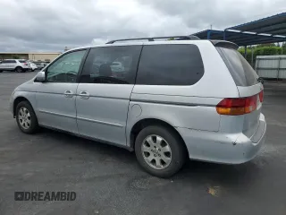 2002 Honda Odyssey EX-L with VIN 2HKRL18902H506828, listed as a Copart auction lot 53735625 with 214,446 mi miles and Salvage title. Bid and sale history available at DreamBid. Image 2.