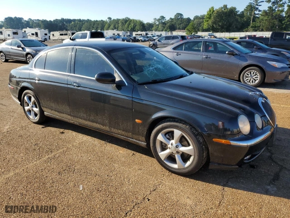 2004 Jaguar S-Type with VIN SAJEA01T04FN08520, listed as a Copart auction lot 58475964 with 67,744 mi miles and Salvage Title. Bid and sale history available at carsss.com. Image 4.