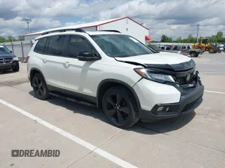 2019 Honda Passport Touring with VIN 5FNYF8H90KB002211, listed as a IAAI auction lot 42347288 with 143,028 mi miles and . Bid and sale history available at DreamBid. Image 1.