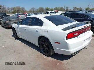 2011 Dodge Charger RT Plus with VIN 2B3CM5CT9BH591577, listed as a IAAI auction lot 41804275 with 126,750 mi miles. Bid and sale history available at carsss.com. Image 3.